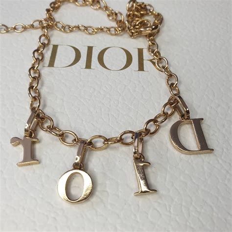 gold dior letter necklace|dior letters necklace value.